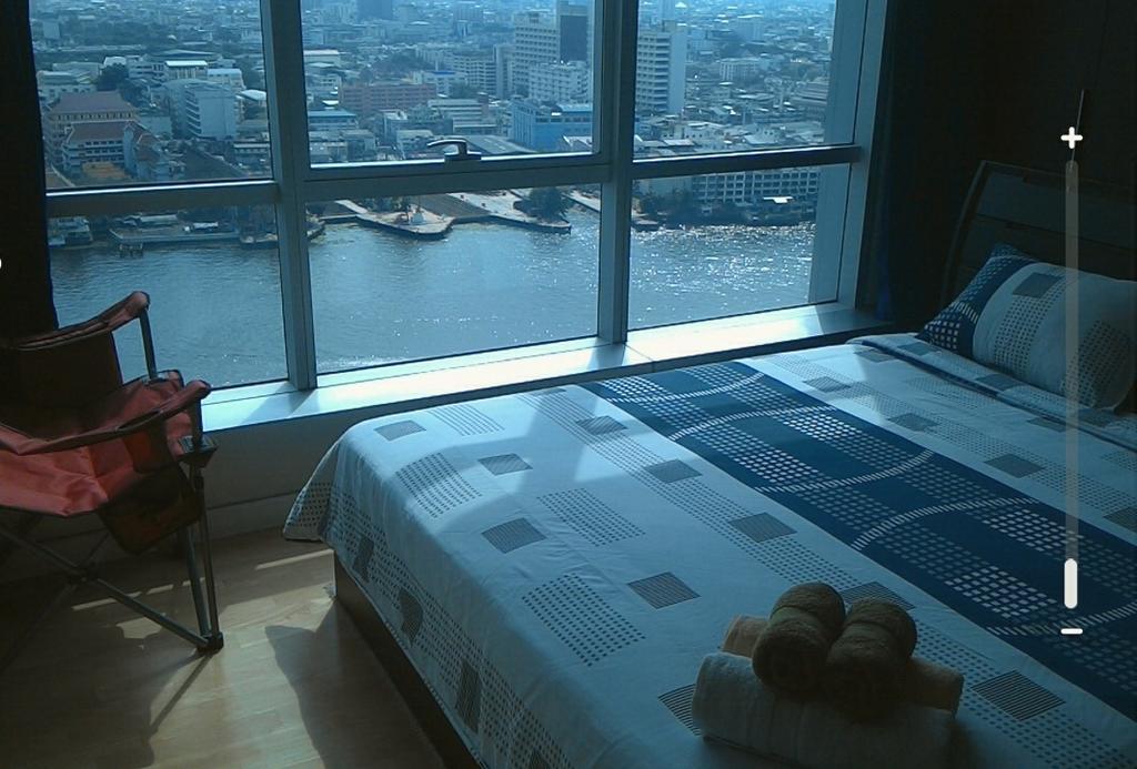 Baan Sathorn Riverfront بانكوك الغرفة الصورة